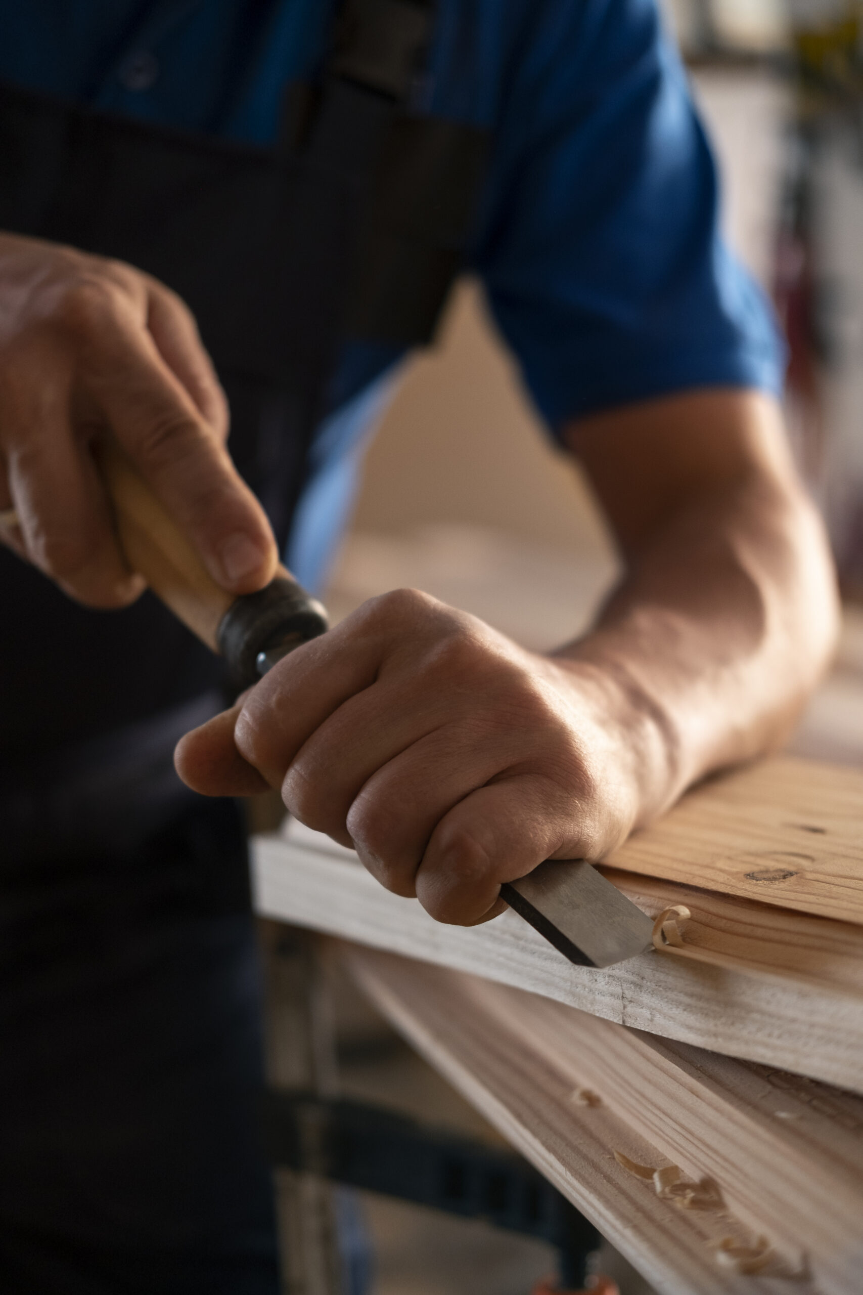male-wood-worker-his-shop-working-with-tools-equipment